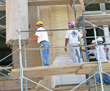 workers working on column section