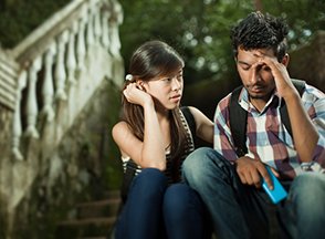 couple sitting on steps together