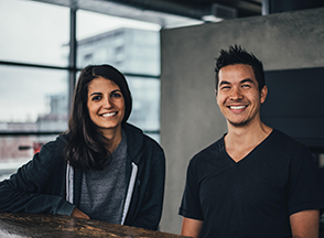 Man and woman smiling
