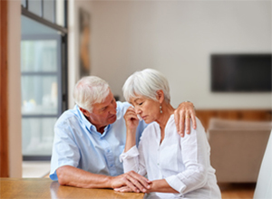 older couple hugging