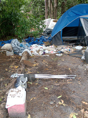 The Homeless Outreach team (HOT) visits a homeless
camp site off Military Trail in Lake Worth.
