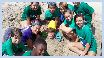 Youths playing in sand