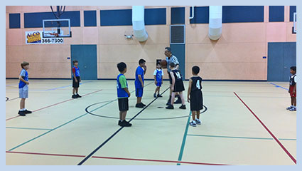 Students playing basketball